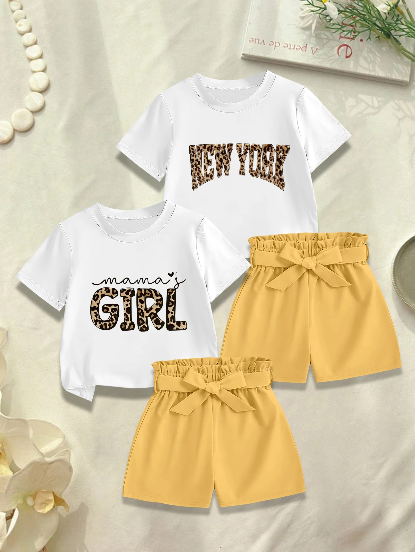 

Комплект из 4 предметов: футболка с английским принтом в мультяшном стиле и милые летние шорты с тканевым бантом для девочек