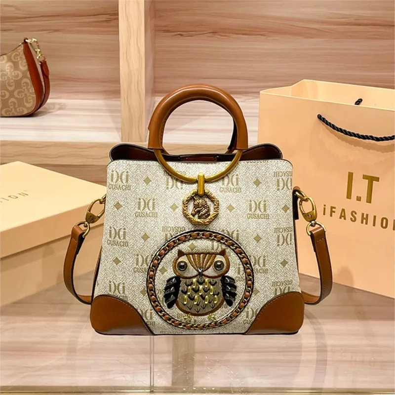 Brand Light Luxury Women's Bag 2027 New High end Retro Bucket Bag Rivet Embroidered Handheld Single Shoulder Diagonal Cross Bag