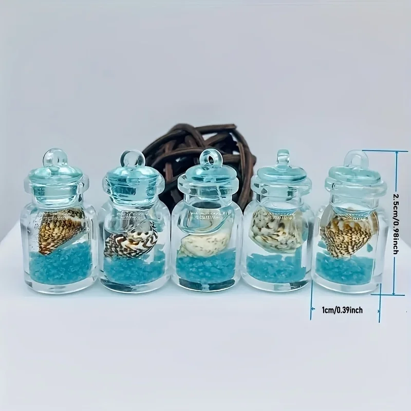 محارات مضيئة في زجاجات زجاجية شفافة، زجاجة انجراف على شكل محارة نجم البحر المحيطي مناسبة لعيد الميلاد ورأس السنة الجديدة