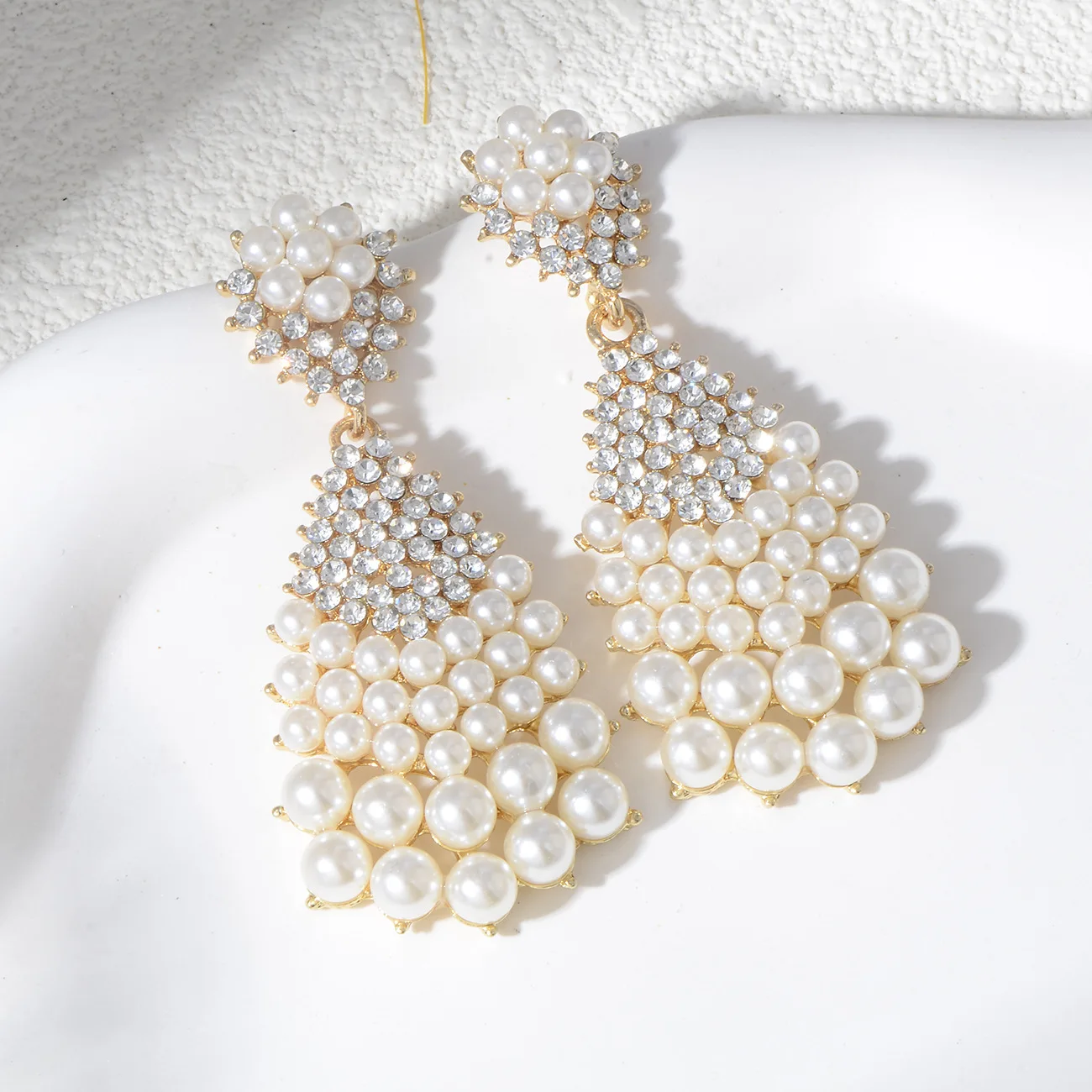 

Amazon luxury pearl earrings slightly inlaid with zircon geometry full of millet pearls large water drop earrings light luxury e