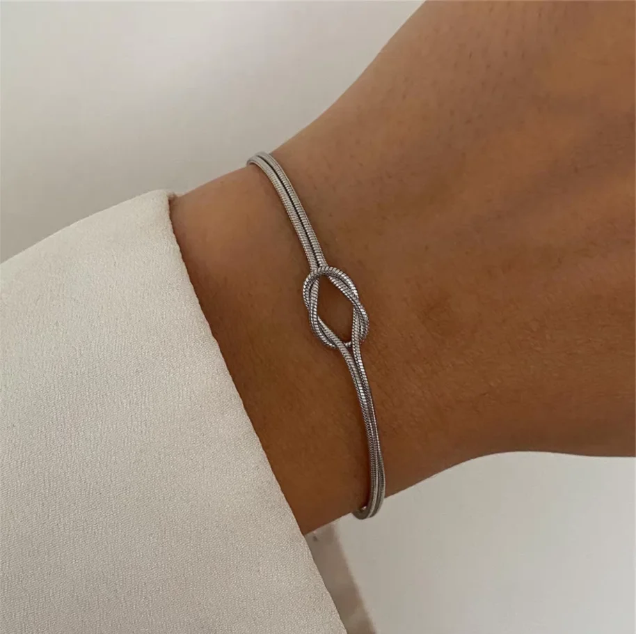 Pulseras de pareja con nudo de amor, pulseras de acero inoxidable chapadas en oro Real de 14 quilates para mujer, regalos ajustables para parejas, moda delicada