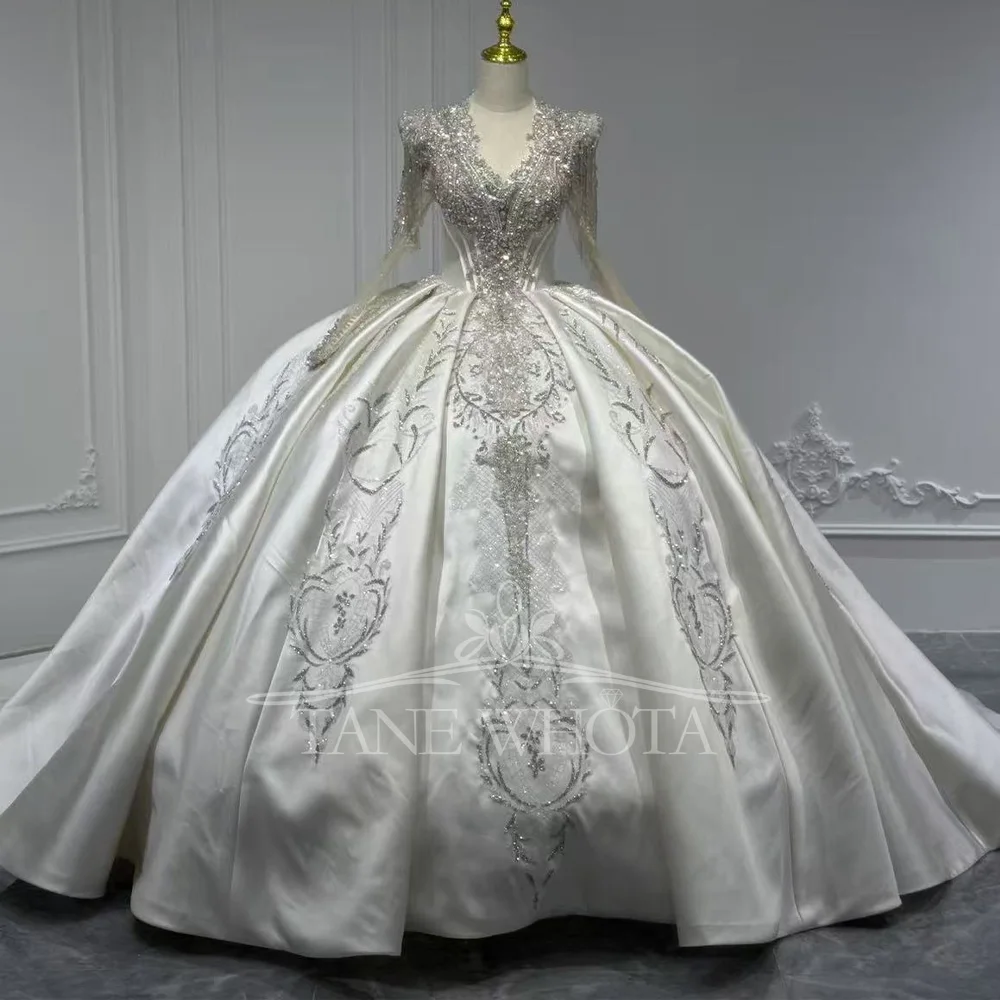 V-Neck Long Sleeve Wedding Dress With Lace-Up Keyhole Back Beaded Sequined Crystal Detail Customizable Gown