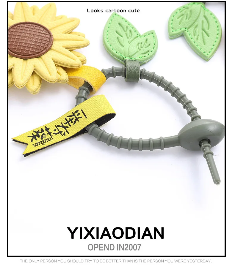 نموذج جديد يفوز المكان الأول مع سلسلة مفاتيح جلدية لموسم التخرج تذكارية حقيبة عباد الشمس قلادة حلقة رئيسية هدية حفلة