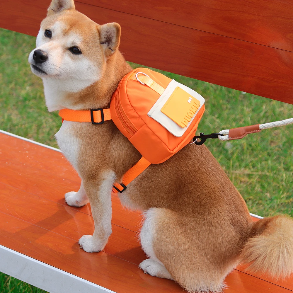 

Dog Backpack Harness, Waterproof, Cartoon Design Free Leash, New Style Can Bring Food Easy To Extract Garbage Bags