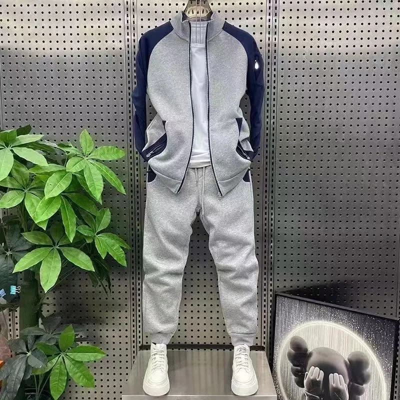 

A new two-piece casual, fashionable and trendy men's color-blocking sport youth outer suit for the autumn and winter of 2025