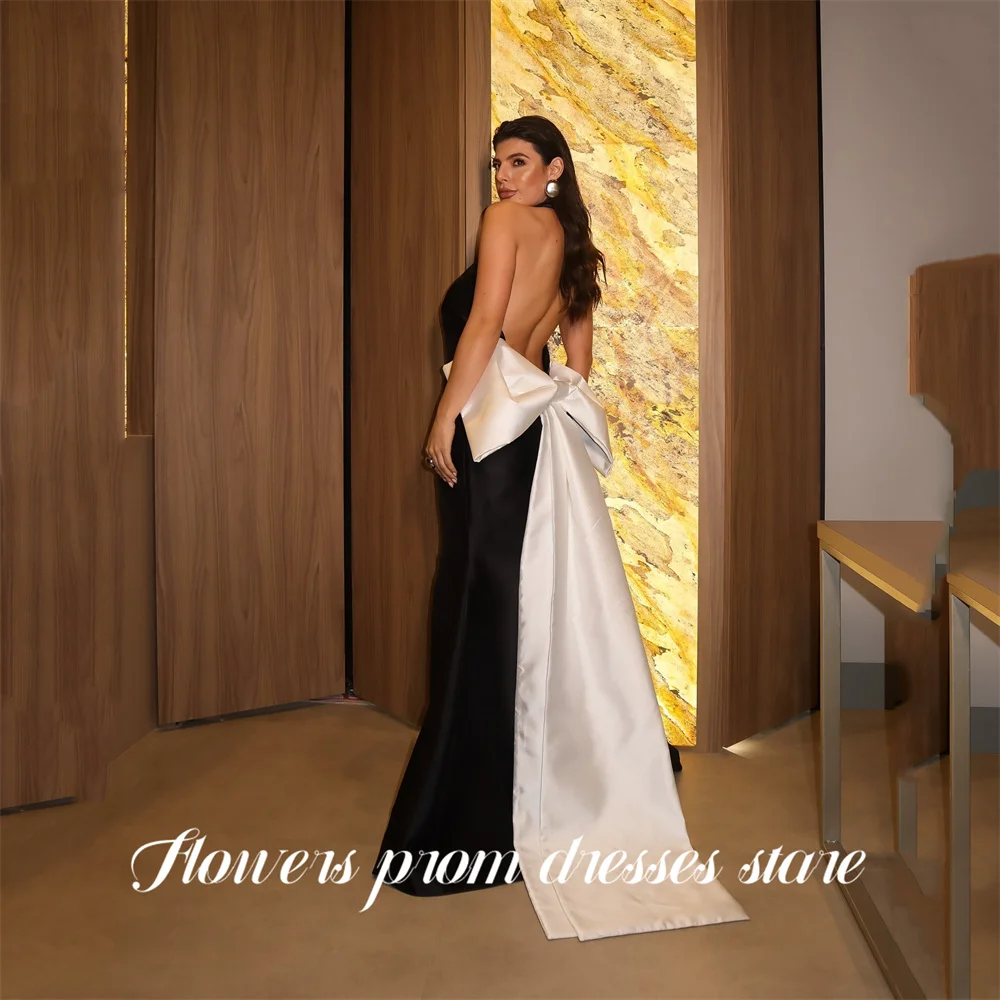 Bloemen zwarte galajurk sexy backless beroemdheidsjurk met contrasterende strik damesavondjurken zeemeermin formele jurk op maat