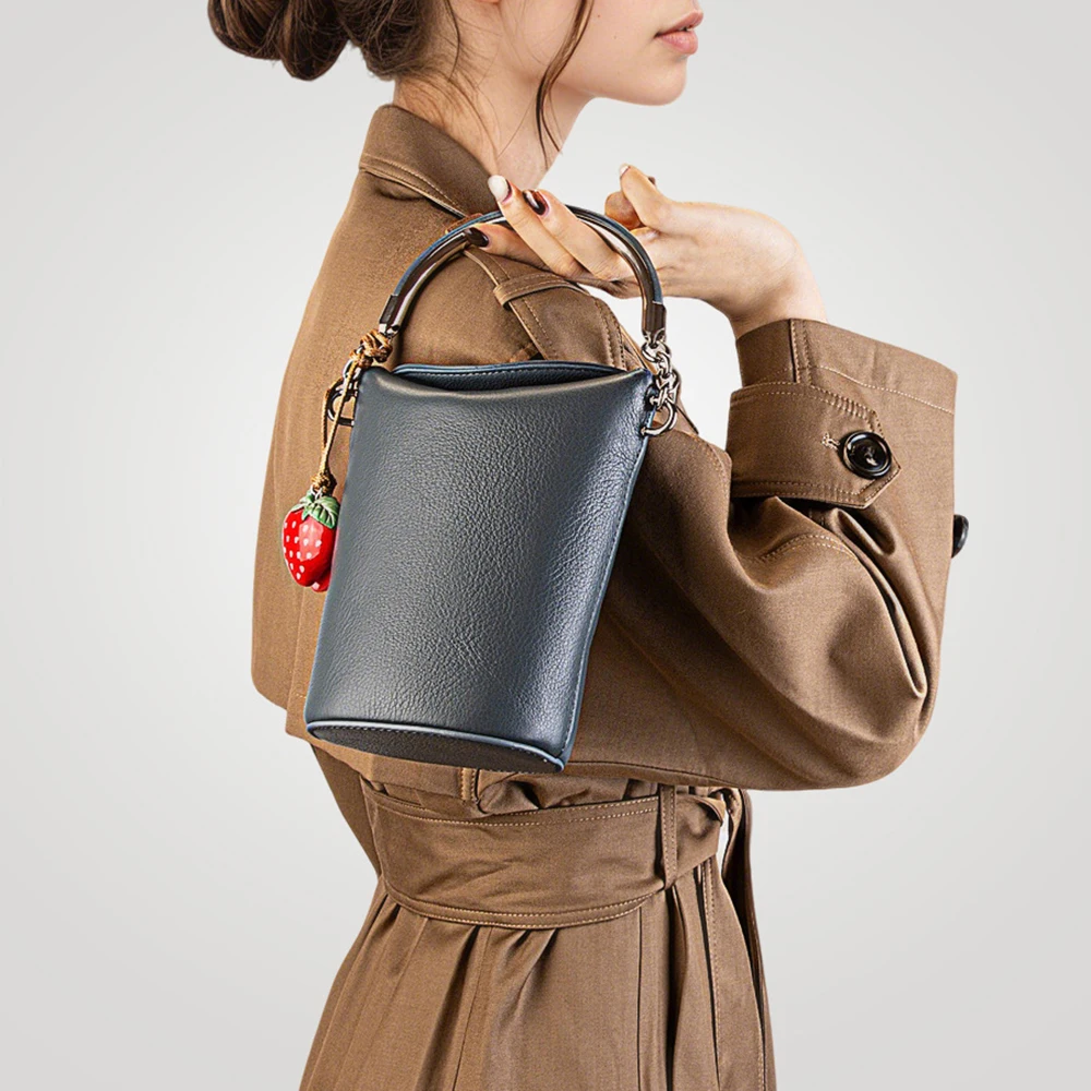 

Новая кожаная сумка из натуральной кожи с цепочкой на плечо, сумка-ведро через плечо, элитная модная сумка для телефона, зимняя популярная