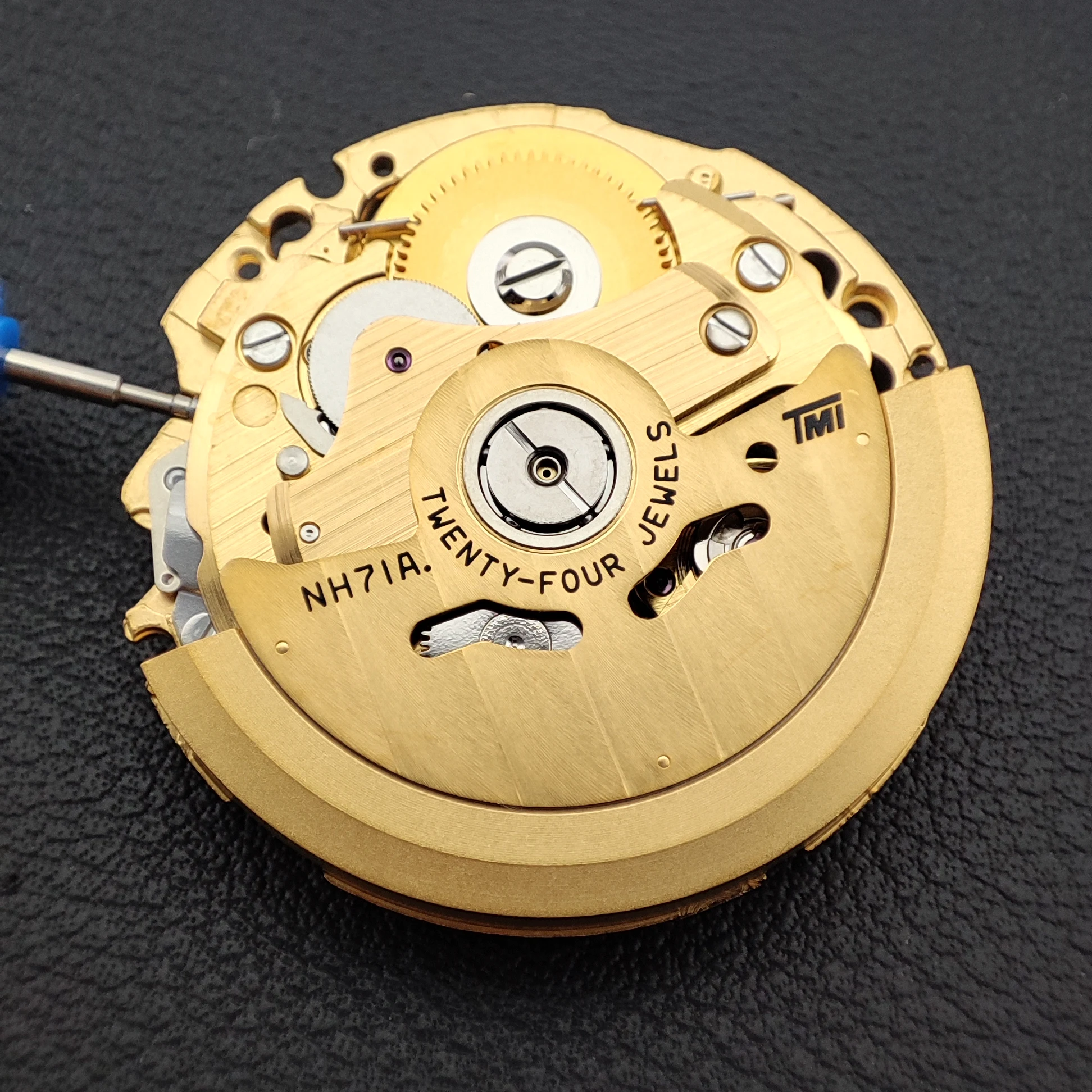 Gerakan NH71 Gerakan Otomatis Mekanis Kerangka Emas 24 Permata Ketepatan Tinggi Timekeeping 3 Tangan Gerakan Jam Tangan NH71A