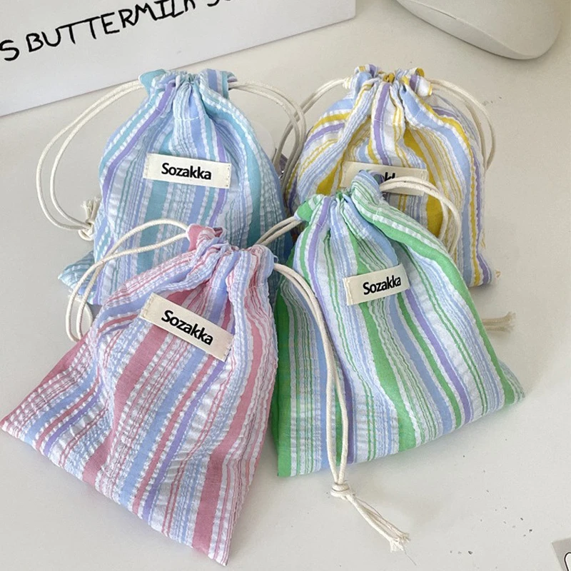 กระเป๋าแต่งหน้าของผู้หญิงญี่ปุ่นจีบลายเชือกรูดกระเป๋าแบบพกพาขนาดกะทัดรัดกระเป๋าเดินทางธุรกิจกระเป๋าเครื่องสำอางสำหรับสาว