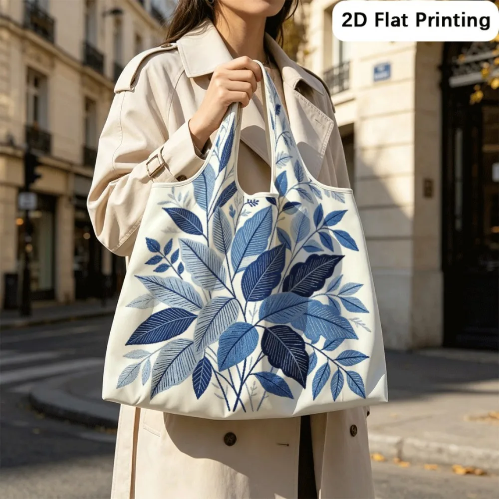 Blue Leaf Embroidery Water‑resistant foldable tote, convertible shoulder bag for trips.