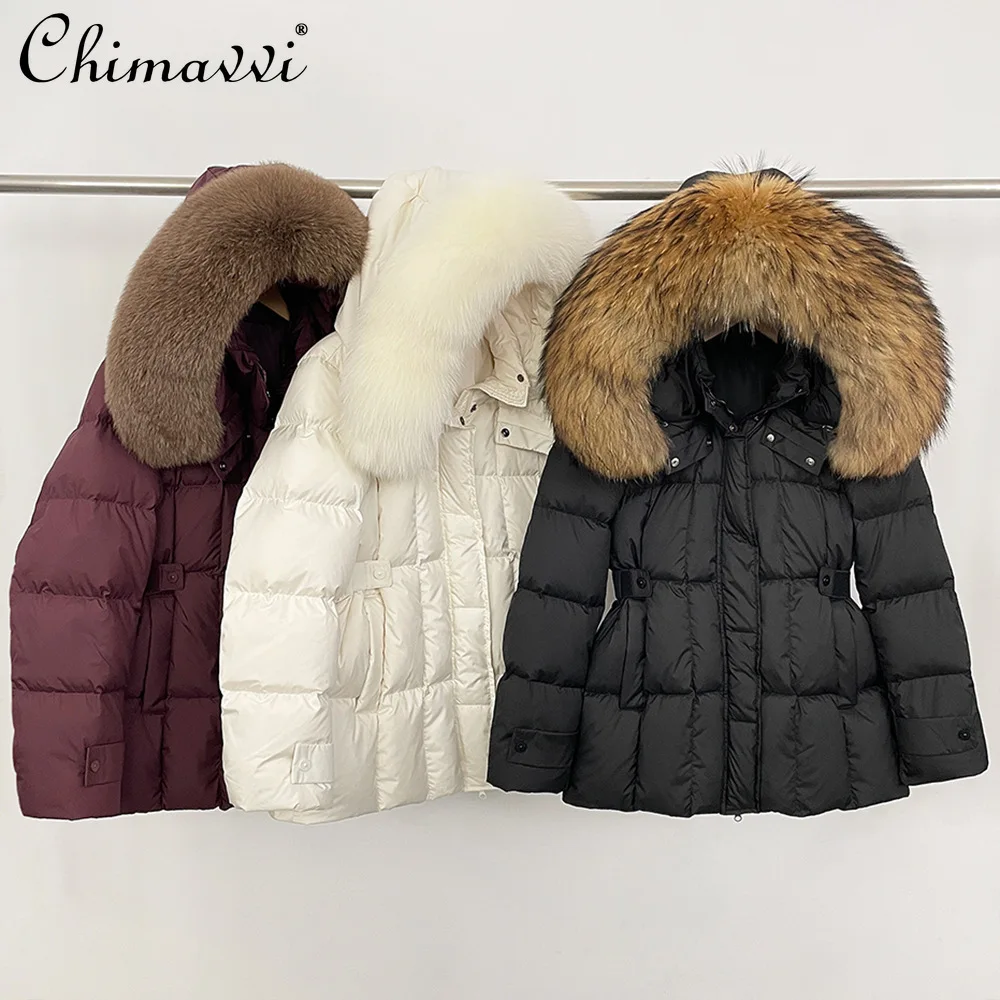 سترات شتوية أنيقة على الطراز الكوري لعام 2025 بياقة من الفرو وسحاب وخصر مطاطي بقصة ضيقة ومتعددة الاستخدامات معاطف للنساء #1