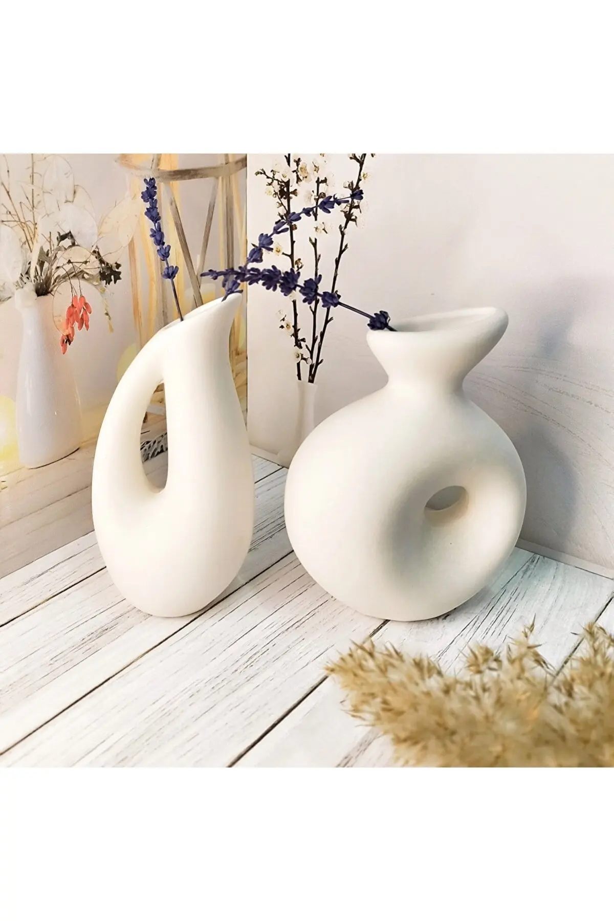 

DELTA AND ALMOND VASE SET OF 2 IS DESIGNED WITH 85. MARBLE POWDER. SPECIALLY DESIGNED CORNER VASE WITH STYLISH LOOK.