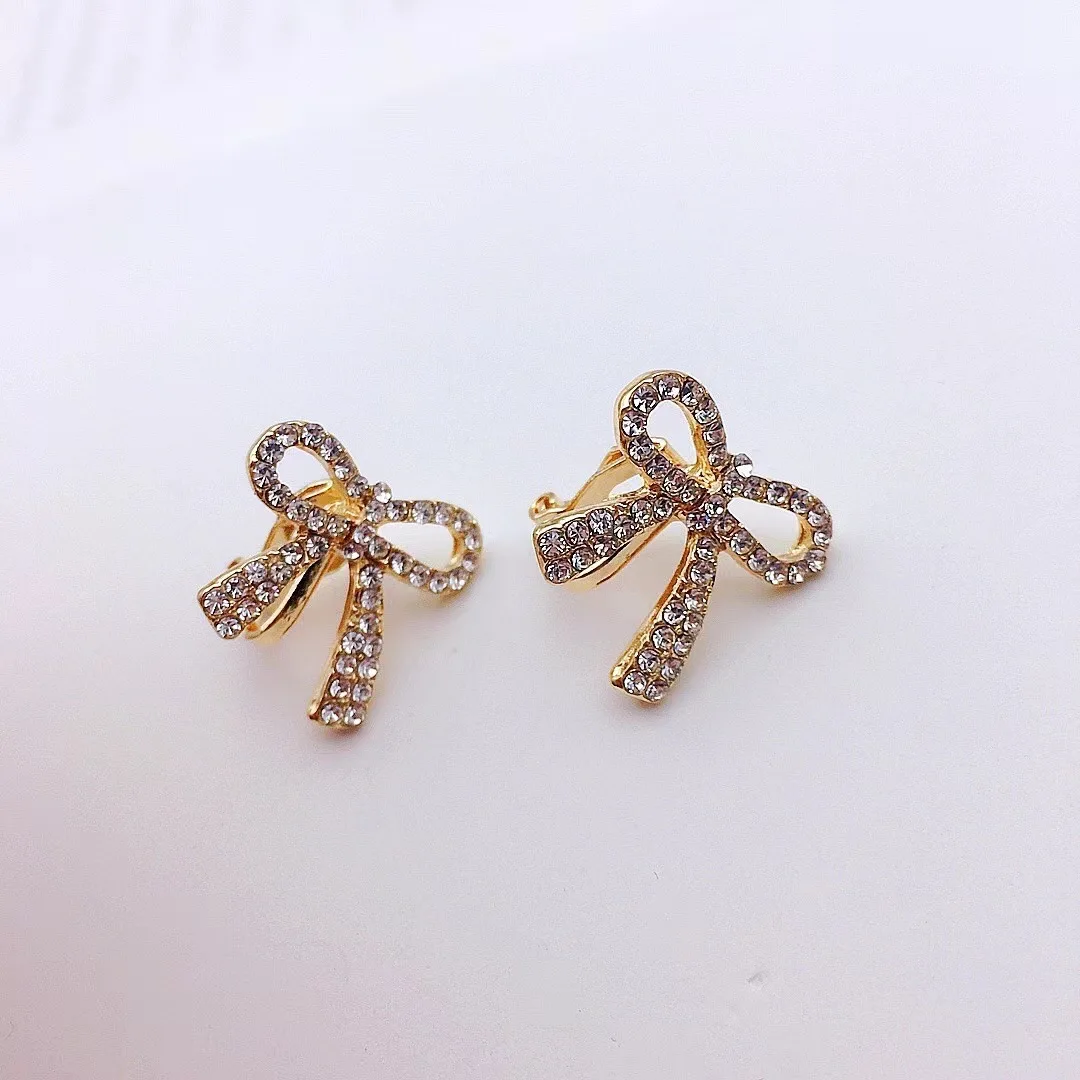 GRACE JUN New Gold Color Rhinestone Bow-knot Shape Clip on Earrings No Pierced Cuff Earrings Neend\'t Ear Hole Earrings Ear Clip