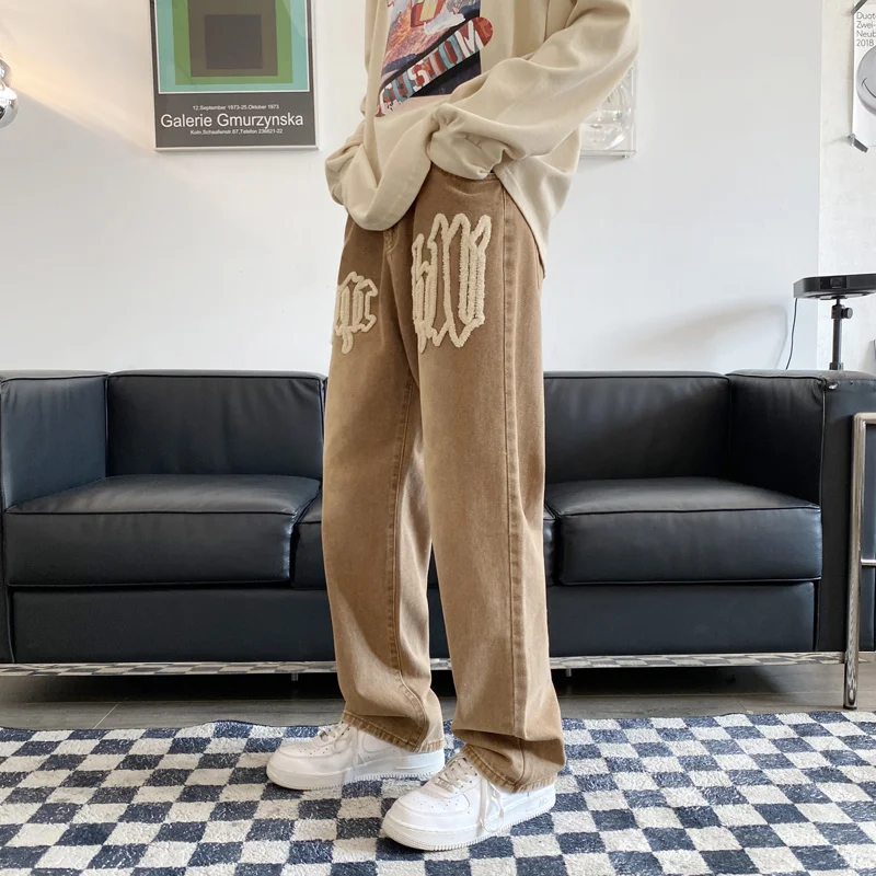 Nuovi Jeans Vintage stampati in schiuma con lettere per uomo Goth Streetwear pantaloni larghi dritti in Denim a gamba larga Y2K pantaloni Casual Hip Hop