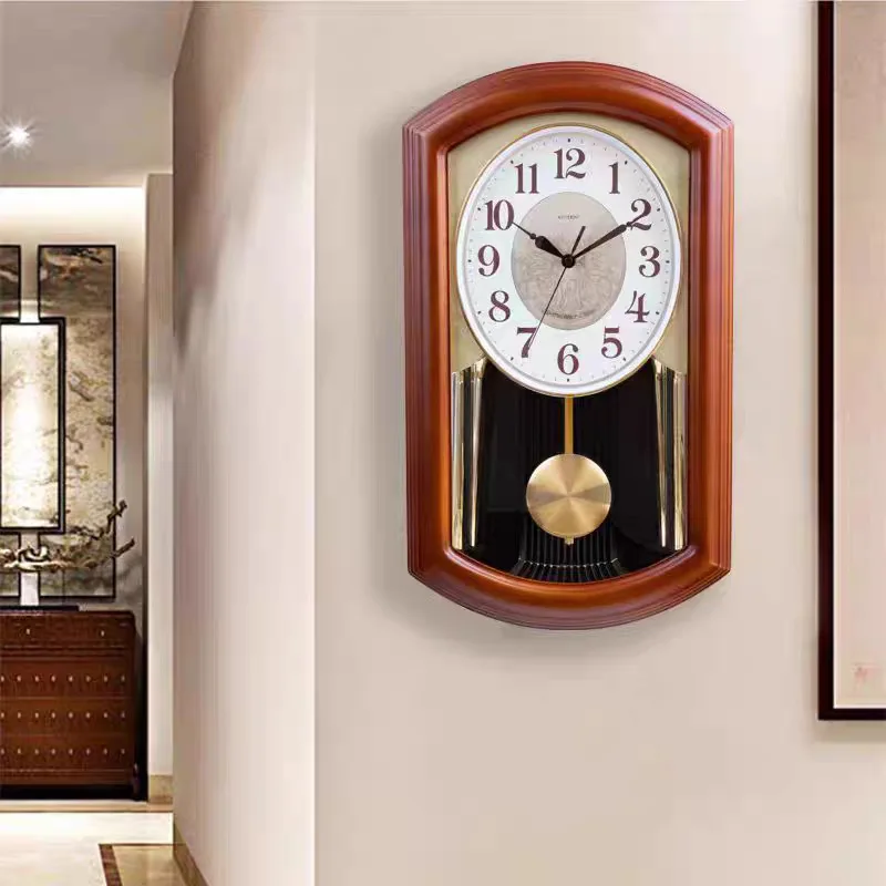 

The hour clock wall clock Chinese retro solid wood wall home creative swing wall watch silent quartz
