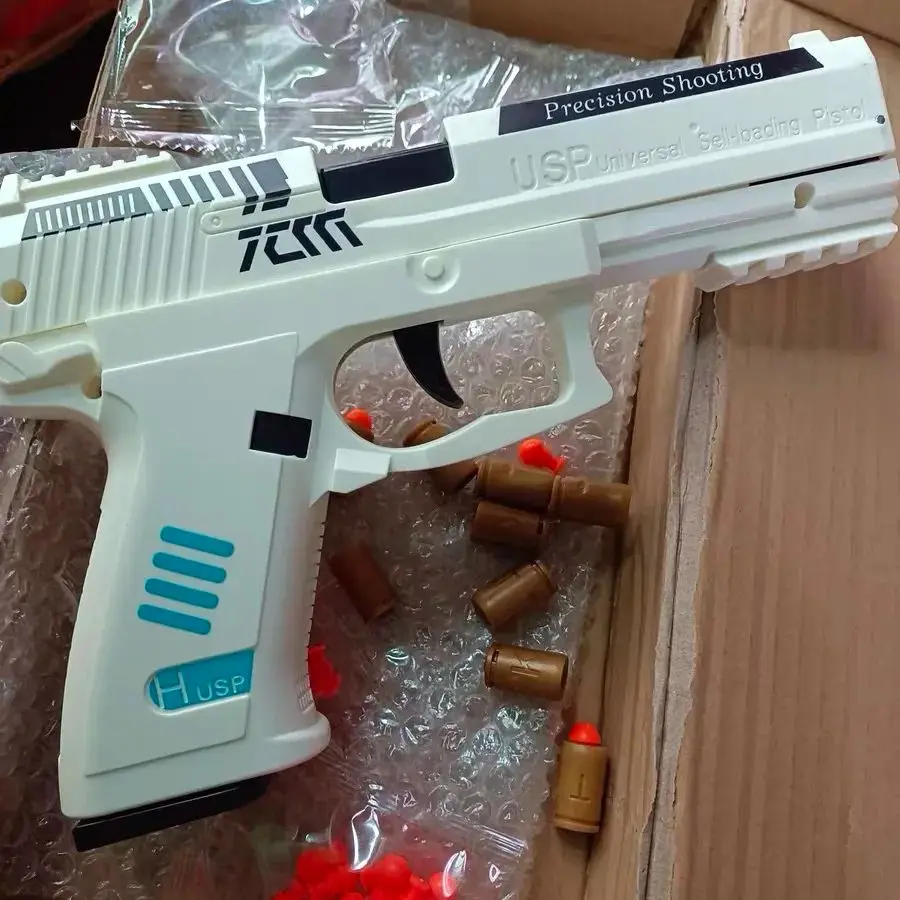 Pistola giocattolo USP Fuoco continuo con guscio da lancio laser Pistola sospesa vuota Lanciatore di giochi all'aperto Regalo di Natale per ragazzi