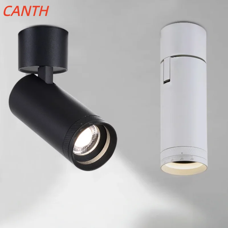 

Fixed-position commercial spotlight with adjustable focus, built-in, high-intensity, color-accurate, adjustable-angle swivel hea