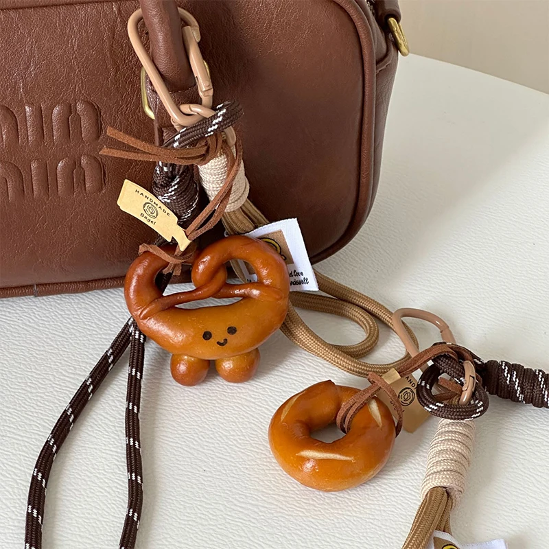 

Creative Alkali Water Bread Keychain Cute Smiling Face Bread Woven Rope Pendant Keyring Backpack Decoration Accessories Gifts