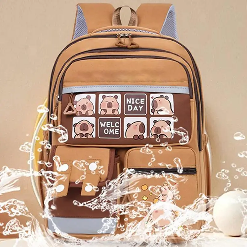 Kapibara กระเป๋าเป้สะพายหลังนักเรียนชั้นประถมศึกษาการ์ตูนความจุขนาดใหญ่กระเป๋าเป้สะพายหลังป้องกันสกปรก Capybara กระเป๋าเป้สะพายหลัง