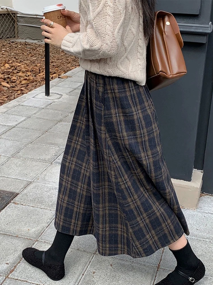 الرجعية منقوشة المرأة تنورة 2025 الخريف جديد عالية الخصر ألف خط التنانير موضة التنانير الطويلة غير رسمية #1