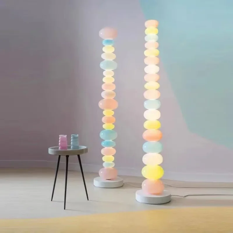Candy rainbow floor lamp next to bedroom sofa Cream creative floor lamp