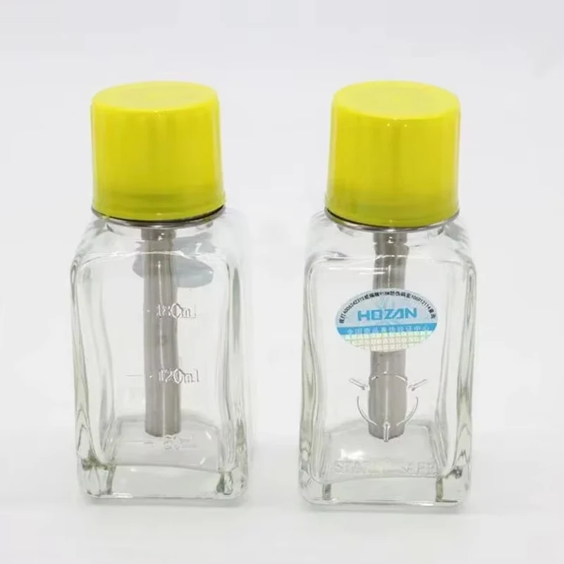 HOZAN 180 مللي نوع الصحافة زجاجة كحول زجاجية صغيرة مسامية دفع من نوع مكافحة رذاذ مكافحة حجب زجاجة تنظيف من الفولاذ المقاوم للصدأ
