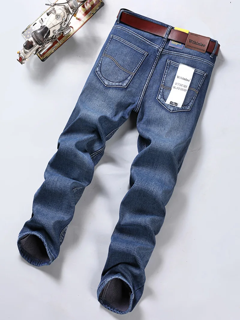 Pantaloni in pile di marca famosa di qualità invernale da uomo Jean Winter Thermal Warm flanella Stretch Jeans pantaloni floccati dritti Denim