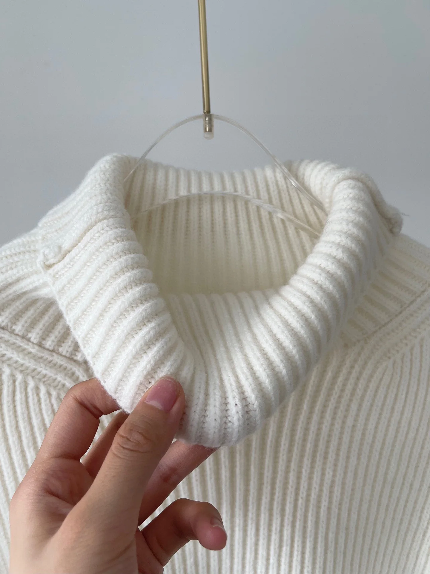 New cashmere wool blend stand up collar, drop shoulder solid color long sleeved knitted sweater sweater