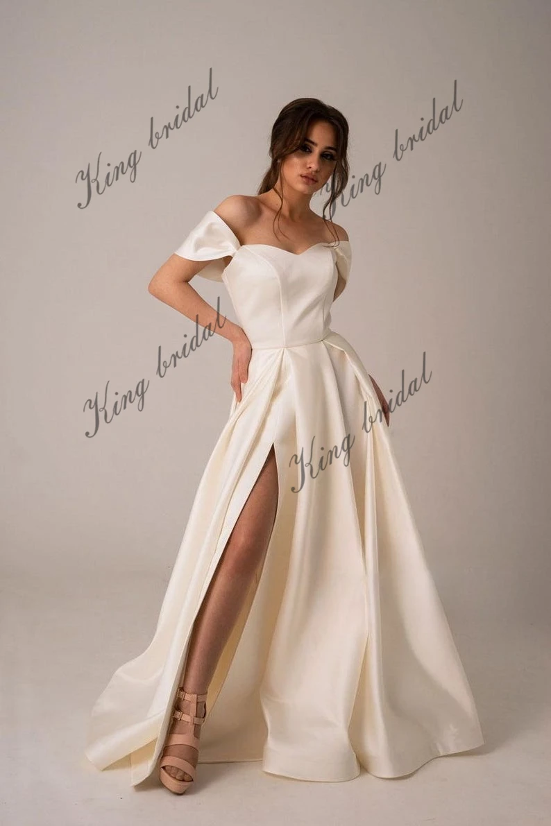 فساتين زفاف مشد برباط من الساتان العاجي بسيطة متواضعة بدون أكتاف بيضاء مع فتحة عالية فستان زفاف حديث على شكل حرف A