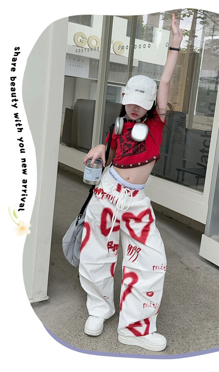Kinder Hip-Hop Modehose mit Kordelzug und Zeichnungen für Teenager-Mädchen Coole Y2K Streetwear-Hose mit Herz-Graffiti 5-14 Jahre – Detail 10