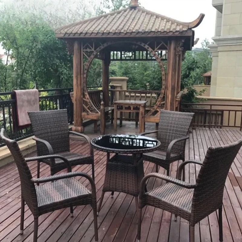 

Nordic outdoor table and chair courtyard outdoor rattan chair combination garden terrace outdoor dining table Internet