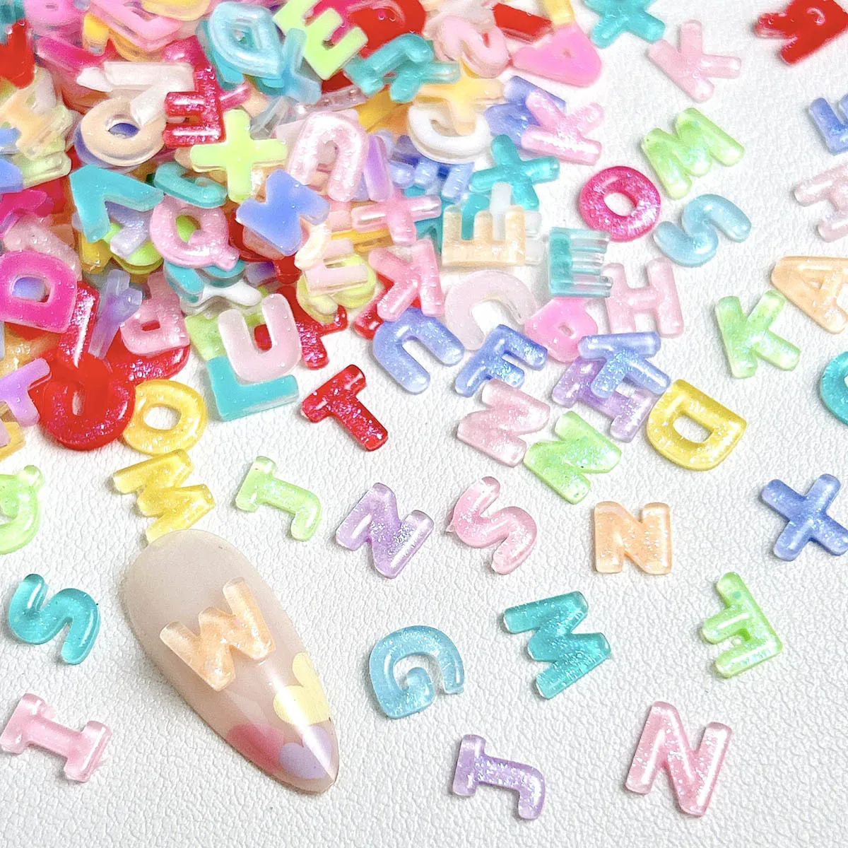 Jalea translúcida, letras coloridas, dijes de resina para uñas, alfabeto inglés luminoso Kawaii regordete, decoraciones artísticas para uñas, piezas para uñas DIY