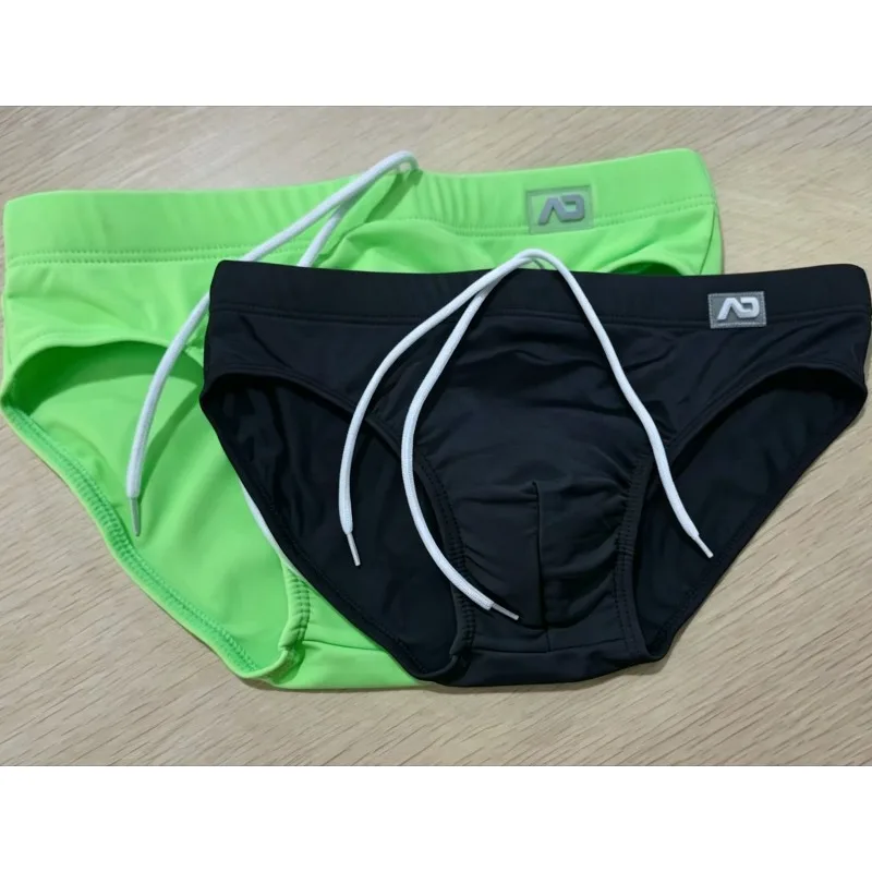 

Мужские плавки-брифы с низкой посадкой, однотонные, из нейлона, с защитой от просвечивания, пляжные шорты на завязках, модель BS420 (реальные фото)