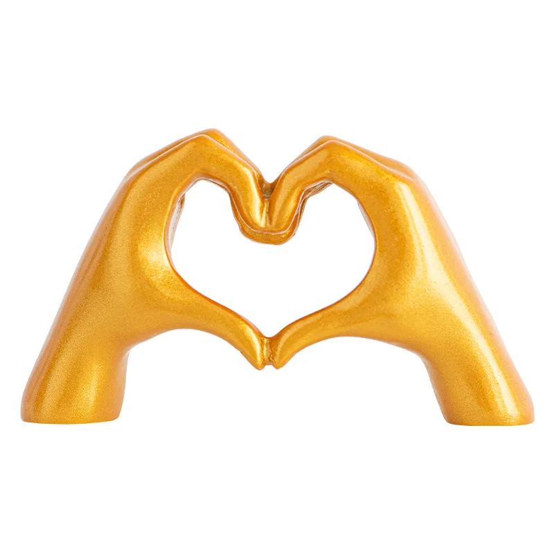 

Modern eco-friendly gold gesture decorative resin heart-shaped decorative home luxury arts and crafts desktop living room