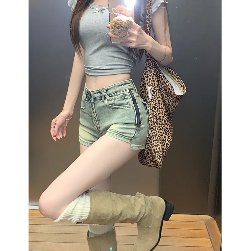 

American niche jeans, women's spring and summer new niche design, versatile flesh covering hot pants, denim shorts