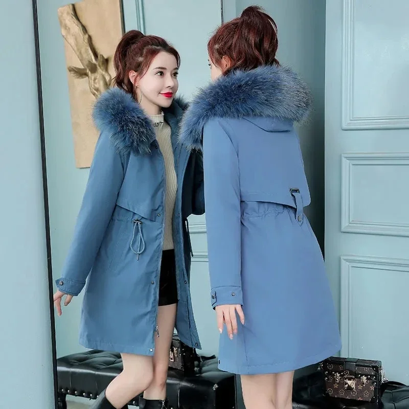 เสื้อแจ็คเก็ตฤดูหนาวสำหรับผู้หญิง ปาร์ก้า 2025 รุ่นใหม่ คอขนเฟอร์ เสื้อโค้ทยาวบุขนสัตว์ มีฮู้ด เสื้อแจ็คเก็ตหนา อุ่น ใส่กันหิมะ เสื้อผ้าบุนวม