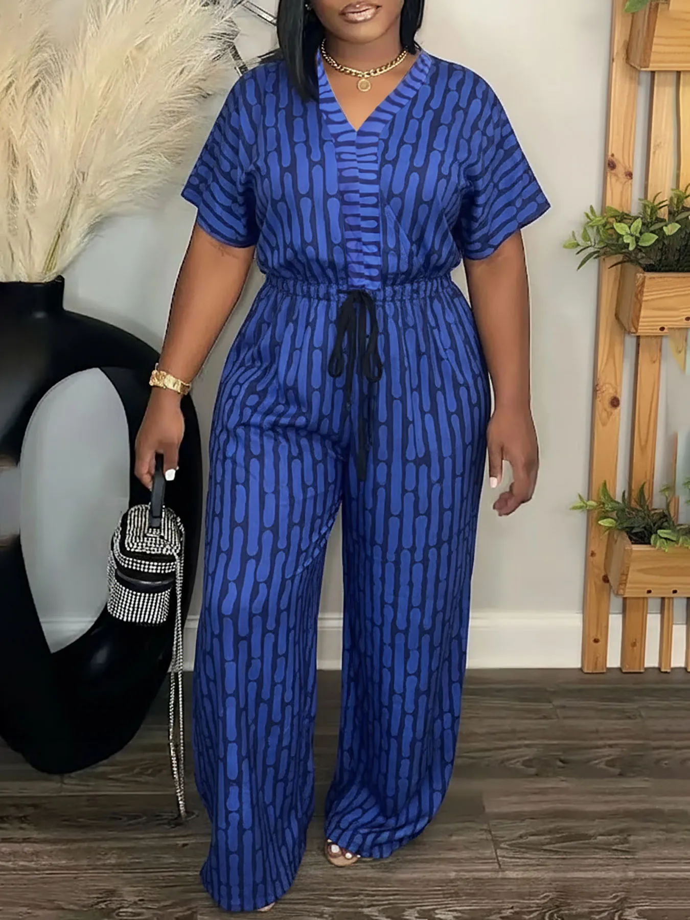 

Best - Seller Alert! Purple - toned Geometric - patterned Waist - cinching Jumpsuit, Blending Style and Comfort