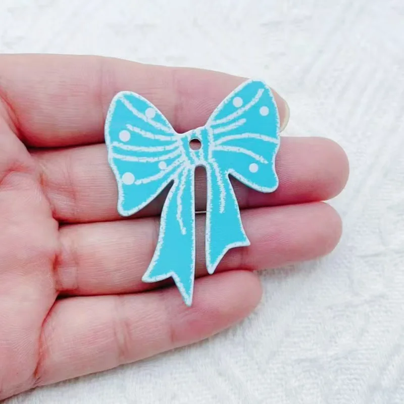 10pcs trendy new multi-color acrylic printed bow bag pendant, mobile phone chain, keychain, car accessories, clothing accessorie view 4