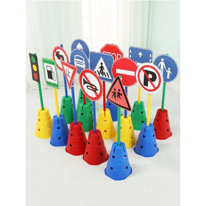 Traffic signs, marking buckets with holes, sensory integration hurdles, road obstacles, card tubes, training equipment