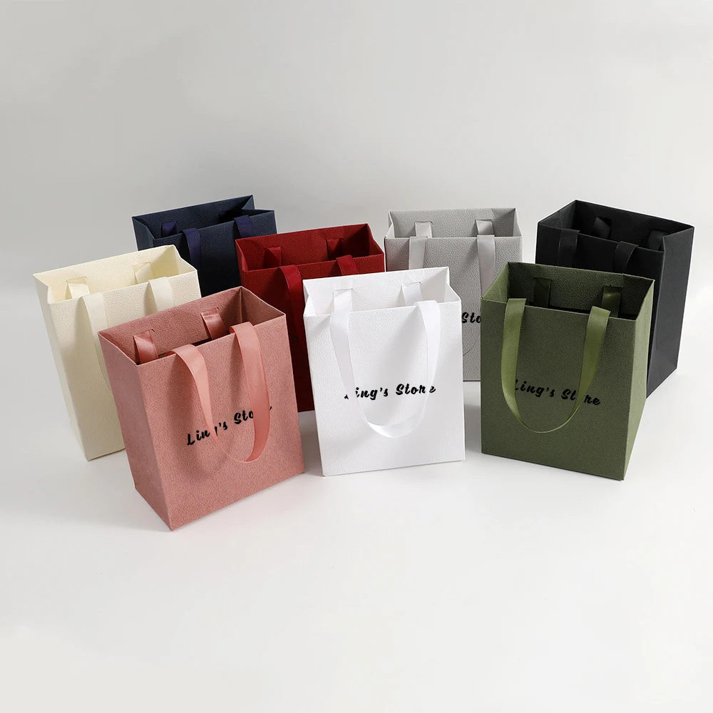 

50Pcs Exquisite 12.5x15x7.5cm Jewelry Paper Gift Bag Boutique Perfume Earrings Bracelet Ring Storage Handle Personalized Handbag