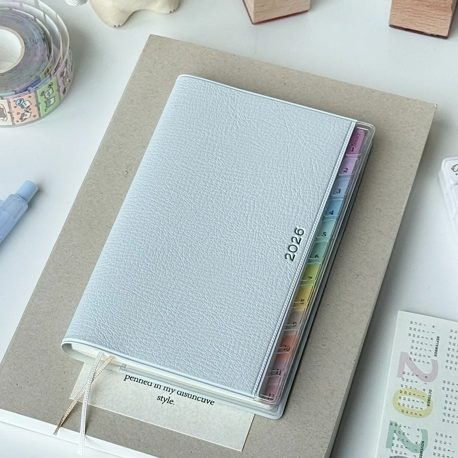 دفتر التقويم مذكرات 2026 مخطط مع مؤشر قوس قزح الجدول القشرية كتيب عالية القيمة ملاحظات العمل الخطة الأسبوعية الشهرية