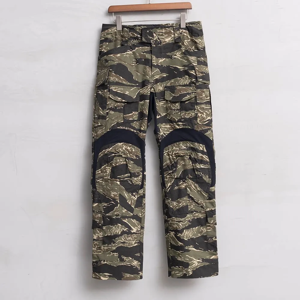 Cut from NYCO fabric, MC 4 model, from CP series, featuring tiger-striped G3 combat and tactical pants.