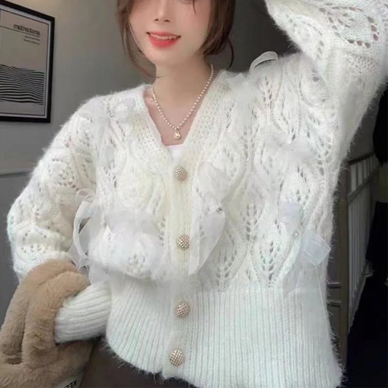 2024 New Gentle Hollow-Out Long-Sleeved Sweater Women'S Plush Tassel Design V-Neck Loose Wholesale