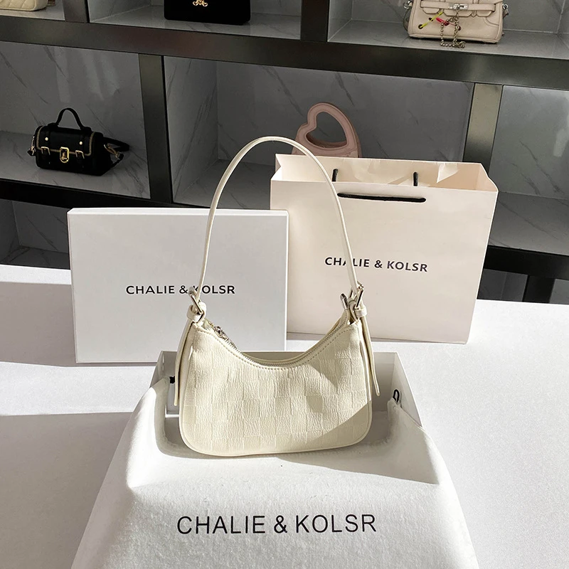 

Creamy crescent moon underarm bag, spring high-end baguette shoulder bag