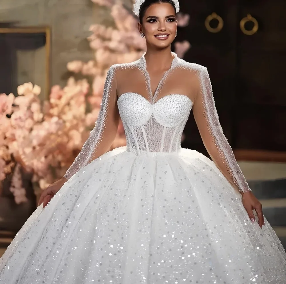 فستان زفاف فاخر مخصص برقبة عالية من الأورجانزا مع حبة مطرزة وأكمام طويلة فستان الزفاف بأزرار فيستدو دي نوفيا