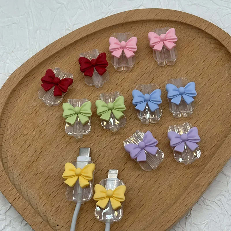2pcs cartoon bow USB charger cable protection cover, suitable for iPhone Xiaomi headphone cable protection winding device