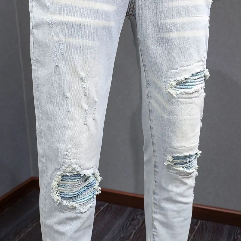 Fashionable new men's jeans with perforated patches washed, nostalgic stretch, slim fit, retro light blue jeans, high street hip