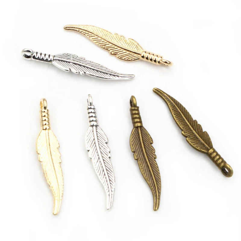 30 sztuk 31x6.5mm pióro Charms wisiorki brąz antyczne posrebrzane KC złoto DIY komponenty do wyrobu biżuterii na naszyjnik bransoletka
