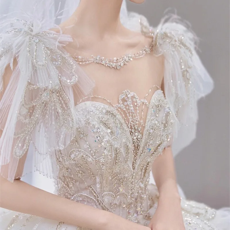 

A new luxurious heavy and textured dress with large tail