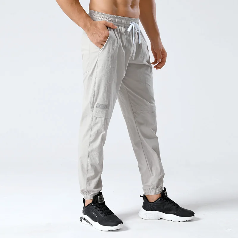 

Активные спортивные брюки для бега, мужские модные однотонные новые свободные весенне-осенние новые спортивные штаны, быстросохнущие дышащие спортивные мягкие брюки